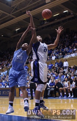 Joy Cheek would rebound the ball with her free arn -  - 