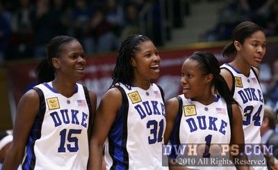 Bridgette Mitchell, Keturah Jackson, Chelsea Hopkins, and Krystal Thomas head to the Duke huddle after a time out -  - 