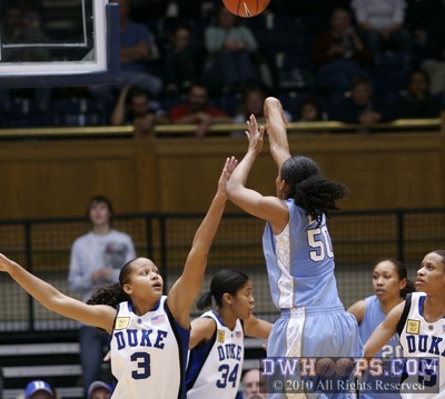 Italee Lucas scores over a Duke zone -  - 