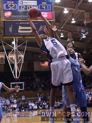 Jasmine Thomas seizes an offensive rebound -  - 