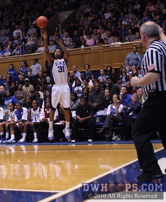 KJ hits a wide open corner trey -  - 