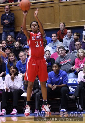 Brittany Strachan strokes in a three from in front of the Duke bench -  - 