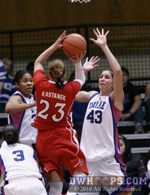Allison Vernerey lurking in the lane, poised to block Marissa Kastanek's shot -  - 