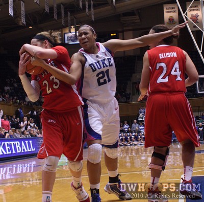 Marissa Kastanek wrests the ball from Joy Cheek -  - 