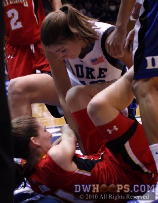 Allison Vernerey (top) ties up Lori Bjork -  - 