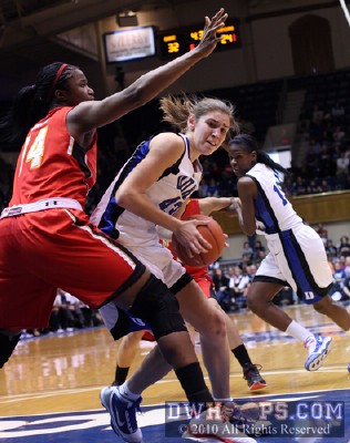 Allison Vernerey drives on Yemi Oyefuwa during Maryland's 11-0 run -  - 