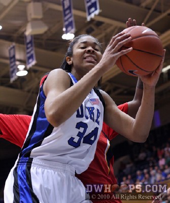 Krystal Thomas grabs an offensive rebound -  - 