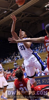 Joy Cheek draws a foul from Diandra Tchatchouang as Lori Bjork hits the deck -  - 