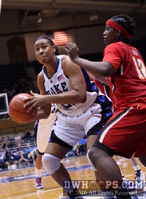 Joy Cheek focuses on the basket as Lynetta Kizer works for position -  - 
