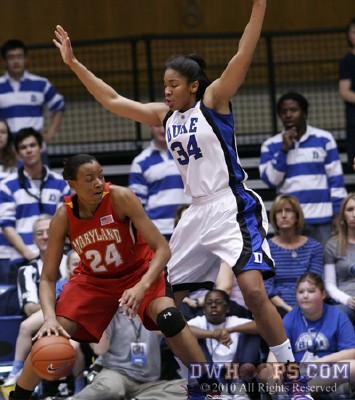 Krystal Thomas guards Diandra Tchatchouang in the lane -  - 