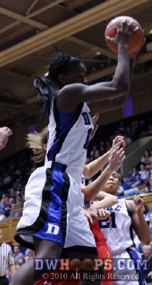 Bridgette Mitchell grabs an offensive board -  - 