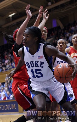 Bridgette Mitchell looks to whirl for a reverse layup -  - 