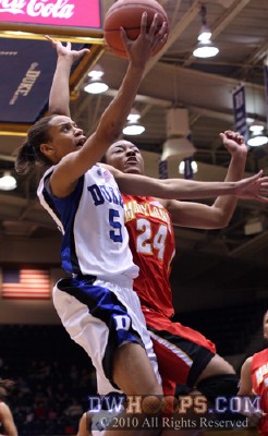 Jasmine Thomas goes in for the layup, but Tchatchouang is there for a spectacular clean block -  - 