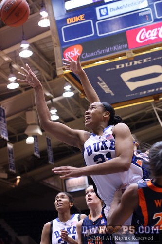 Joy Cheek drives to the basket, drawing a foul from Monica Wright -  - 
