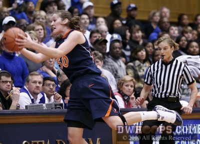 Chelsea Shine saves the ball for UVa as Dee Kantner watches the sideline -  - 