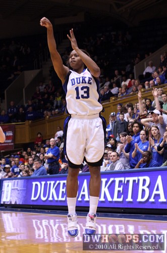 Karima Christmas is all alone, and drains a three point shot -  - 