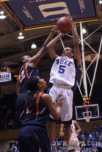 Monica Wright elevates to block Jasmine Thomas's shot -  - 