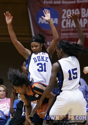 Keturah Jackson (31) and Bridgette Mitchell force Paulisha Kellum into taking steps -  - 