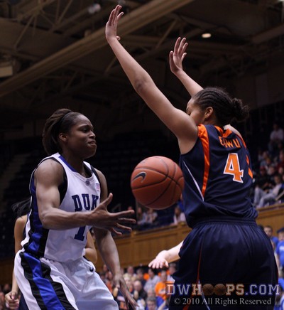 Karima Christmas passes the ball to an open teammate past Simone Egwu -  - 