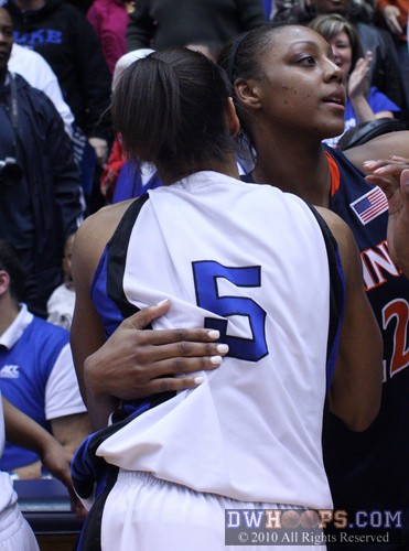 Duke's Jasmine Thomas and Virginia's Monica Wright embrace in the post game handshake line.  Each will be first team All-ACC, with Wright likely claiming POTY honors -  - 