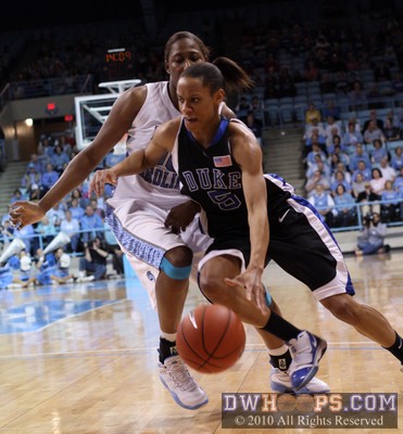 Jasmine Thomas drives past Nyree Williams -  - 