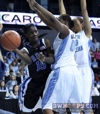 Bridgette Mitchell heaves a pass down the baseline -  - 