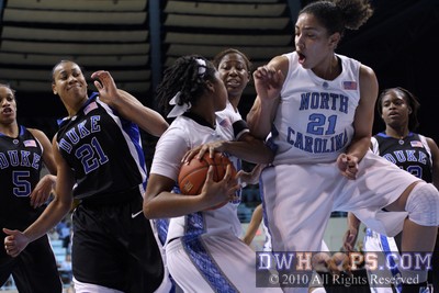 Joy Cheek recoils as Tierra Ruffin-Pratt gathers in another UNC defensive rebound -  - 