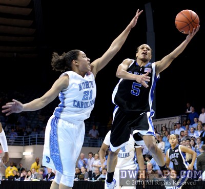 Jasmine Thomas soars to the hoop past Krista Gross.  In step with Duke's day, it too was a miss. -  - 