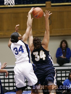 A sweet block for Krystal Thomas, rejecting the shot of Jessica Geiger.  Thomas had Duke's only two blocks. -  - 