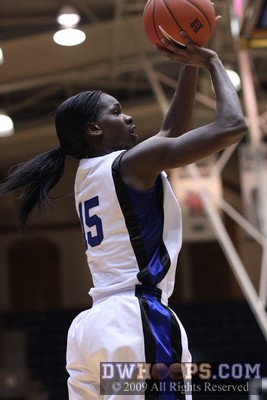 Bridgette Mitchell takes a baseline J -  - 