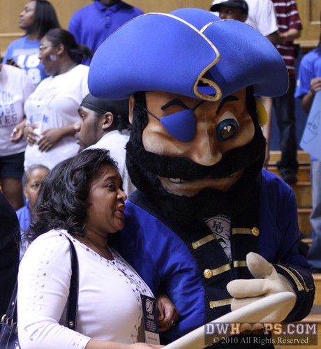 Hampton cheerleading coach with the Pirate mascot before the game -  - 