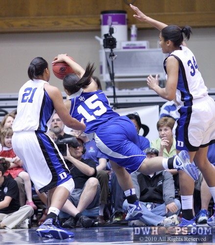 Hampton's Melanie Warner goes sprawling across the lane -  - 