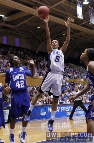 Quanneisha Perry (42) backs off as Air Jasmine Thomas is again ready for launch -  - 