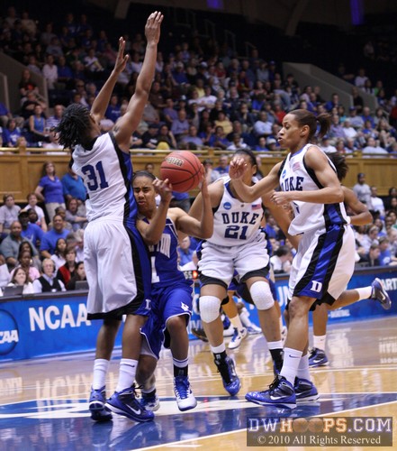 Bernadette Fortune meets Keturah Jackson in the lane, foul on KJ -  - 