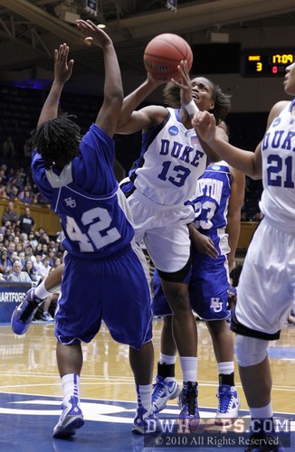 Karima Christmas draws a foul from Hampton's Quanneisha Perry (42) -  - 
