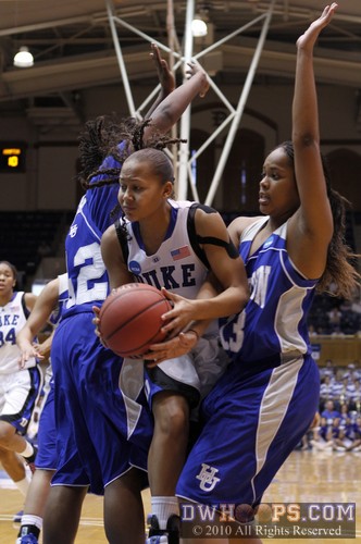 A tight squeeze for Duke's Shay Selby -- splitting the Hampton defense of Quanneisha Perry (left) and Keiara Avant (right) -  - 