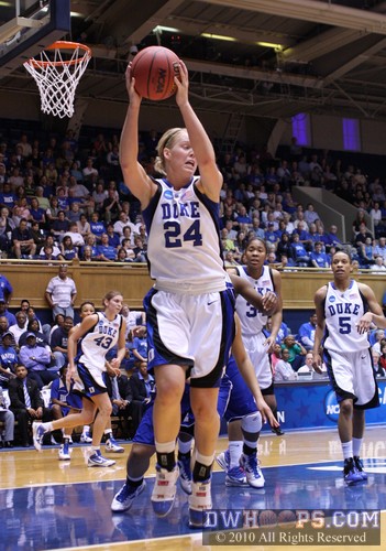 Kathleen Scheer rips down a defensive board -  - 