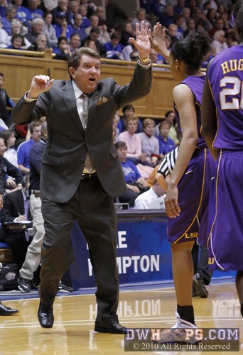 The always animated Van Chancellor comes off the LSU bench to high five Katherine Graham.  Van was fighting a bad cold, but you'd have never known it during the game. -  - 