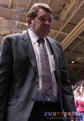 A concerned Van Chancellor heads for the visitors' locker room at halftime, -  - 