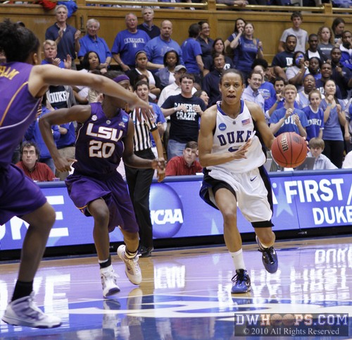Jasmine Thomas sees LSU help in the lane and looks to dish to the wing -  - 