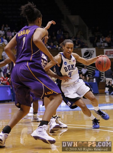 Jasmine Thomas is funneled towards Katherine Graham (1) who was ready to swipe the ball, and did. -  - 