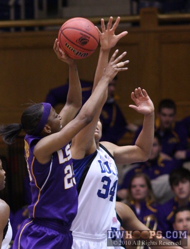 Krystal Thomas disrupts LSU's Allison Hightower on the blocks -  - 