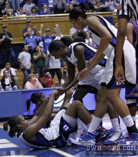 Karima Christmas helped up by her Duke teammates -  - 