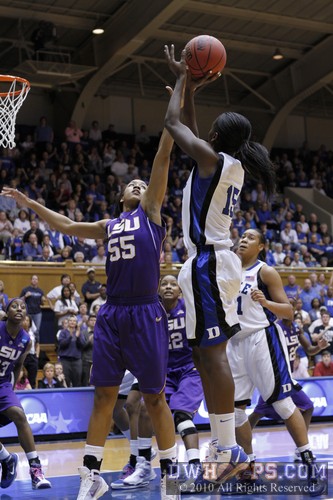 Bridgette Mitchell launches yet another dagger, this one over Lasondra Barrett and nothing but net -  - 