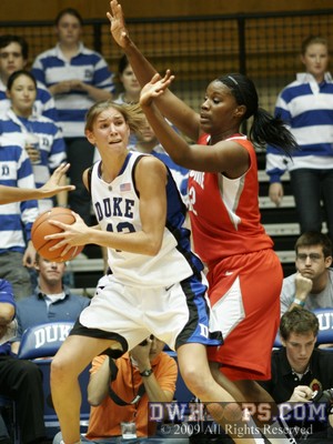 Allison Vernerey looks for help after getting the ball in the low blocks -  - 
