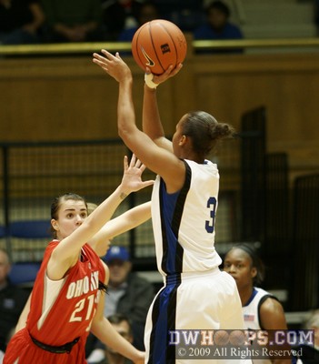 Shay Selby hits a three pointer over Samantha Prahalis to put Duke up by five points -  - 