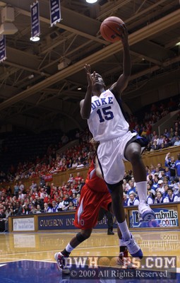 Bridgette Mitchell, who was hampered by foul trouble most of the night,  scores in transition -  - 