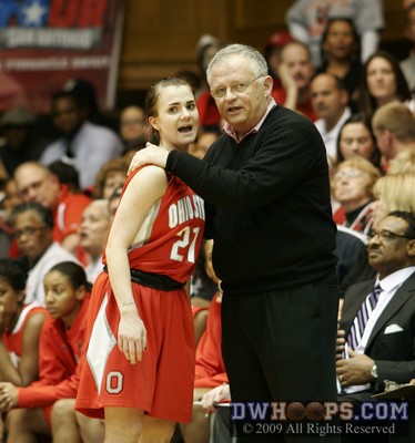 Ohio State head coach Jim Foster tries to settle down his emotional point guard Samantha Prahalis. -  - 