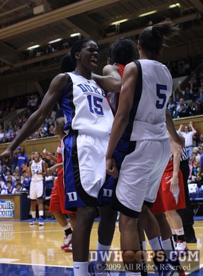 Chest bump for Jasmine Thomas from Bridgette Mitchell after the layup -  - 
