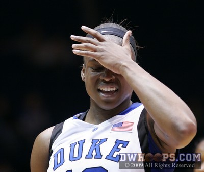 Karima Christmas at the line after being smacked in the face.  Her hoop and free throw was part of a critical 8-0 Duke run -  - 